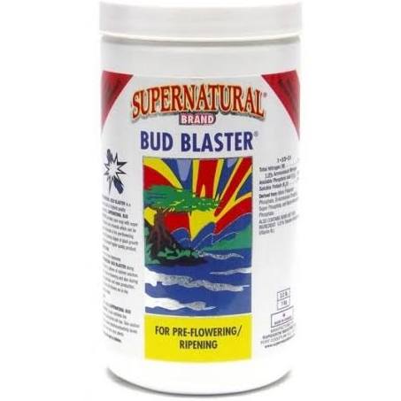 A container of Supernatural brand Bud Blaster, labeled for pre-flowering and ripening, with a visual of a plant on the label.