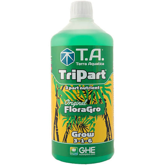 A bottle of T.A FloraGrow 1ltr, which is a part of the TriPart nutrient series for hydroponic gardening.
