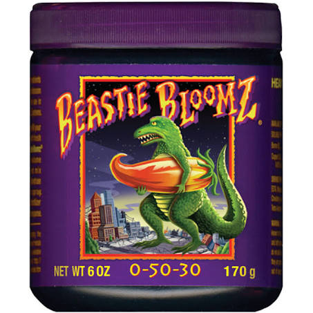 A container of Beastie Bloomz, a flowering booster made by Fox Farms, with a label featuring a cartoon dinosaur and cityscape.